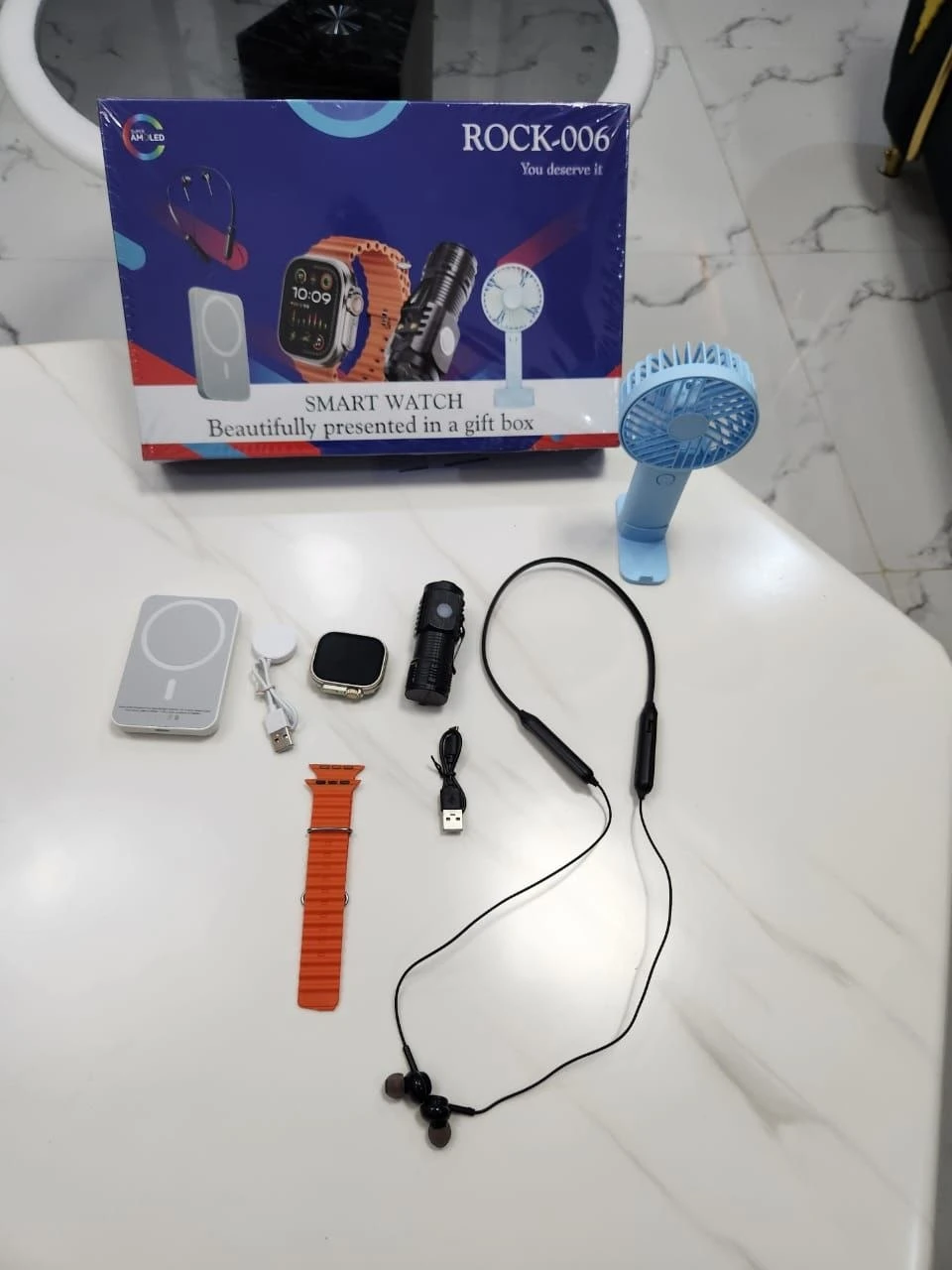 ROCK SMART WATCH 5 IN 1, WIRELESS CHARGER, HANDFAN, TOUCH, SMART WATCH EARPOD
